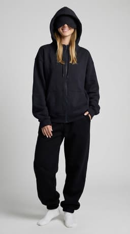 Black oversized zip-up hoodie — front view