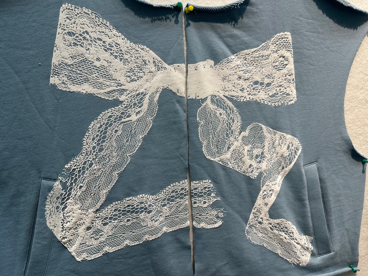 Handcrafted lace appliqué — attention to detail